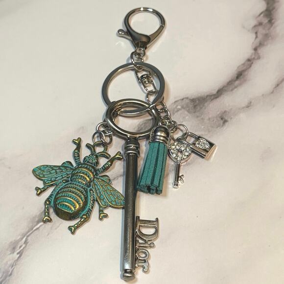Dior Silver Key with a Turquoise Bee, Tassel, Heart, & Lock Charms Keychain - Picture 1 of 5